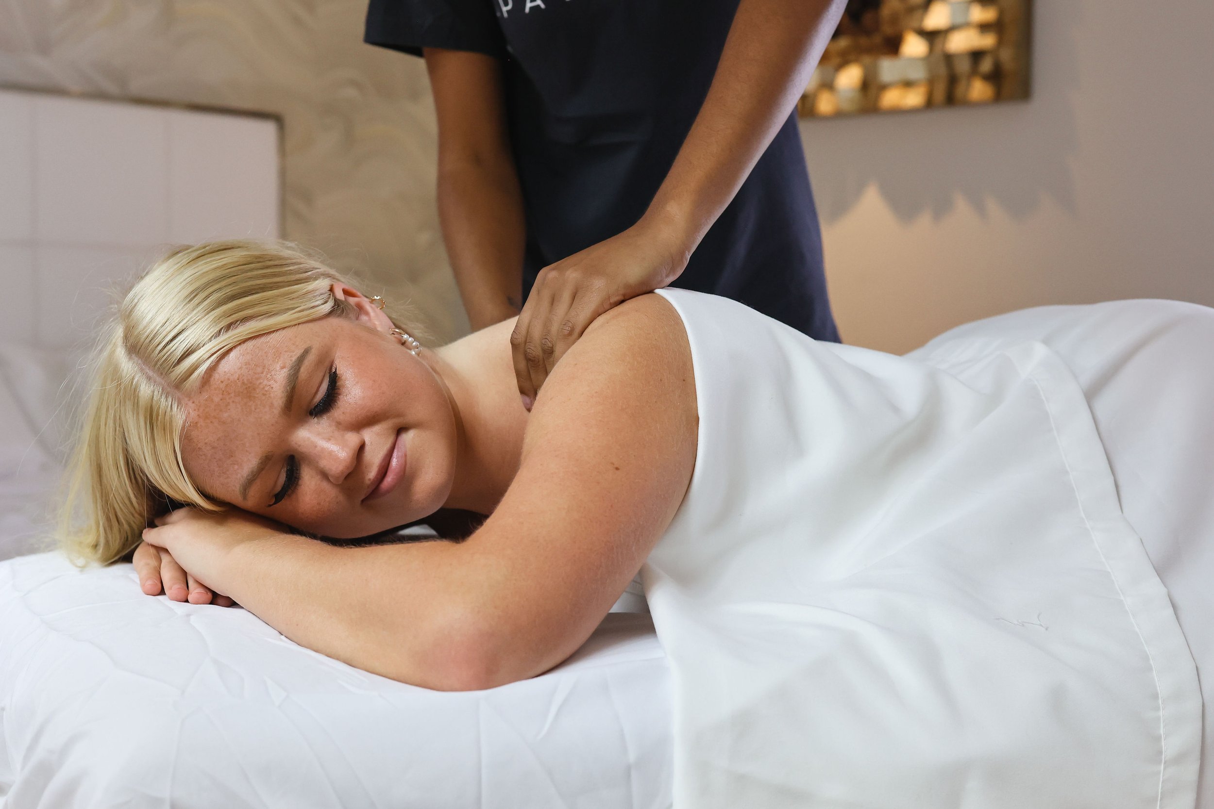 What Are Some Easy Self-Massage Techniques for Business Trips?